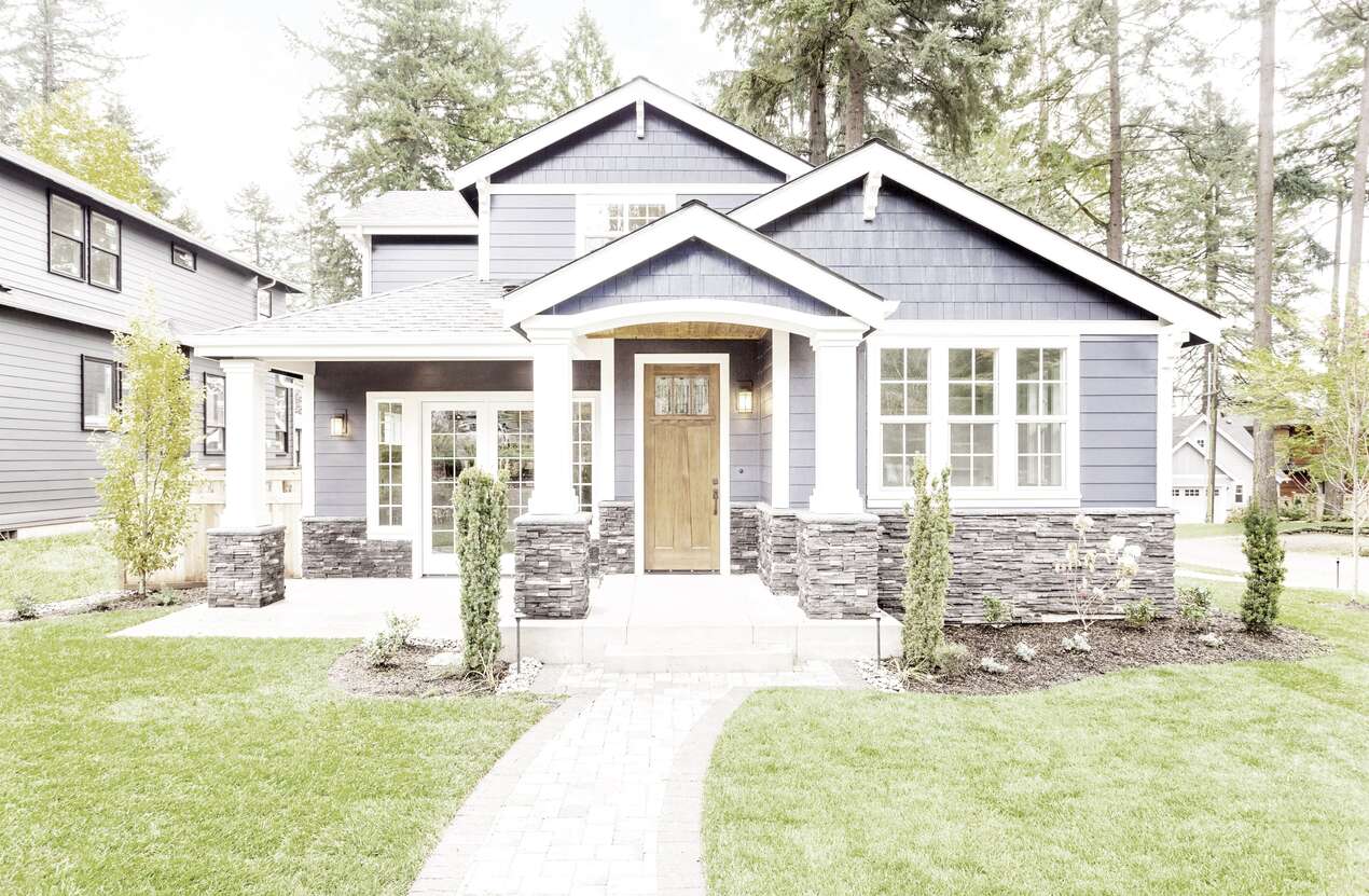 Front of a house in daylight from the perspective of someone with achromatopsia. Second of five stages.