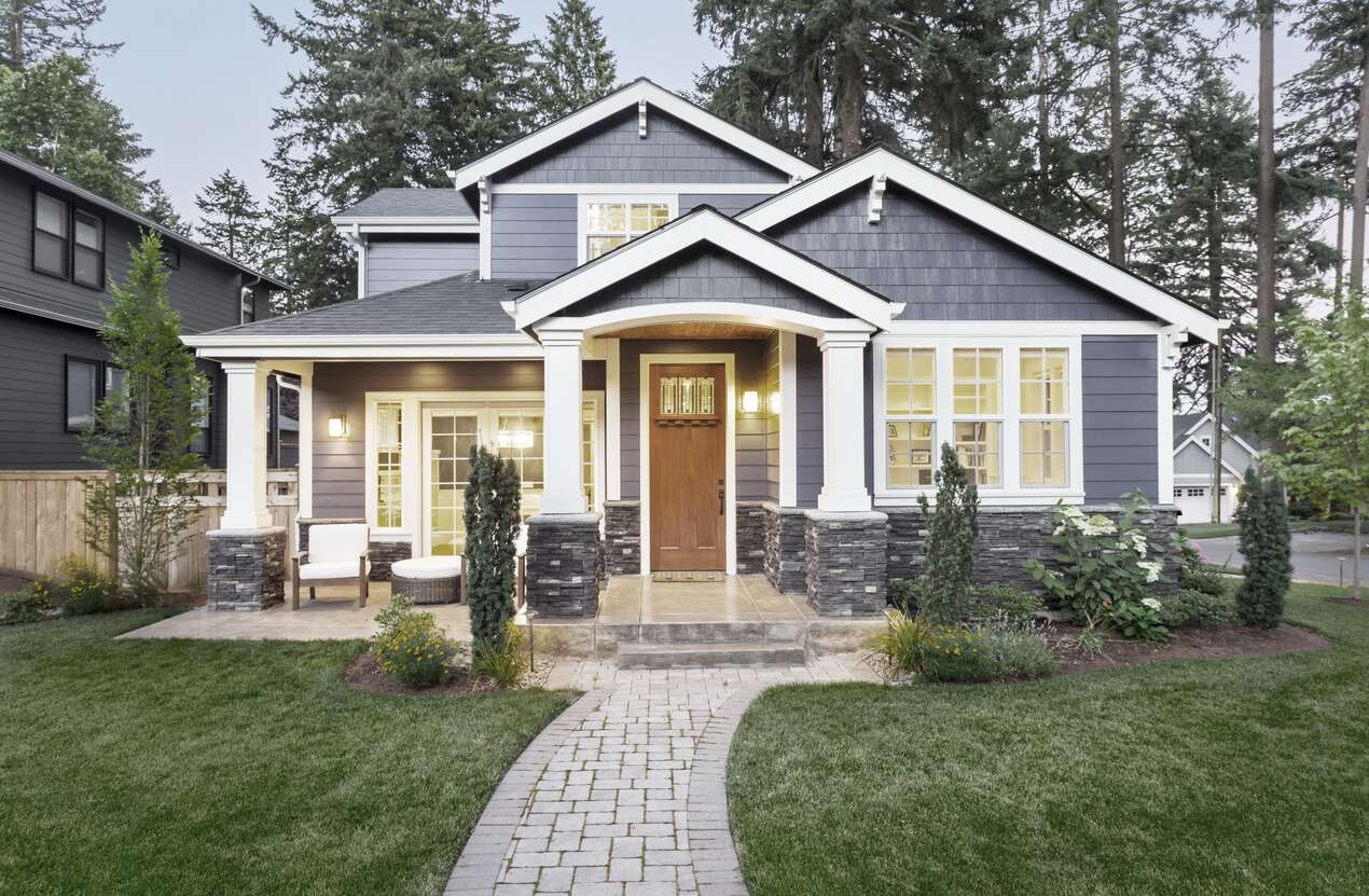 Front of a house at night from the perspective of someone with achromatopsia. First of five stages.