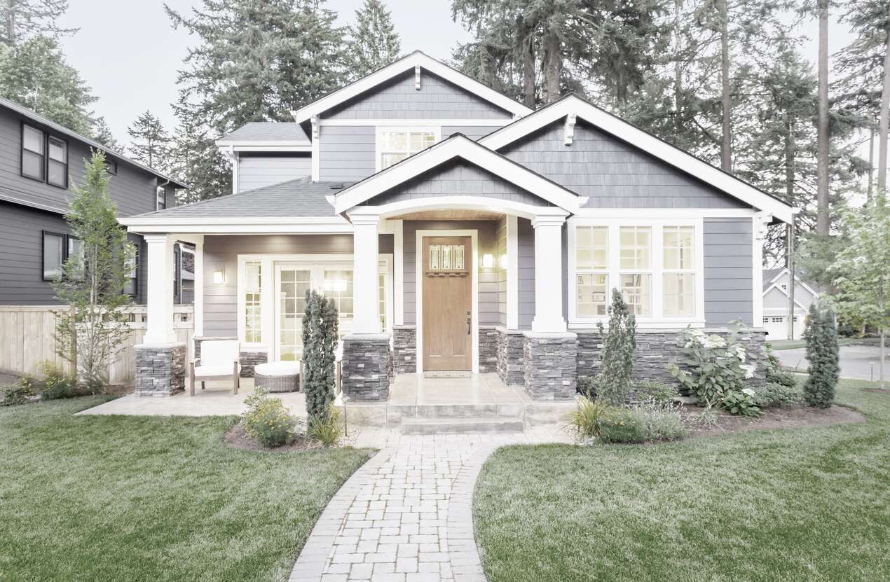 Front of a house at night from the perspective of someone with achromatopsia. Third of five stages.