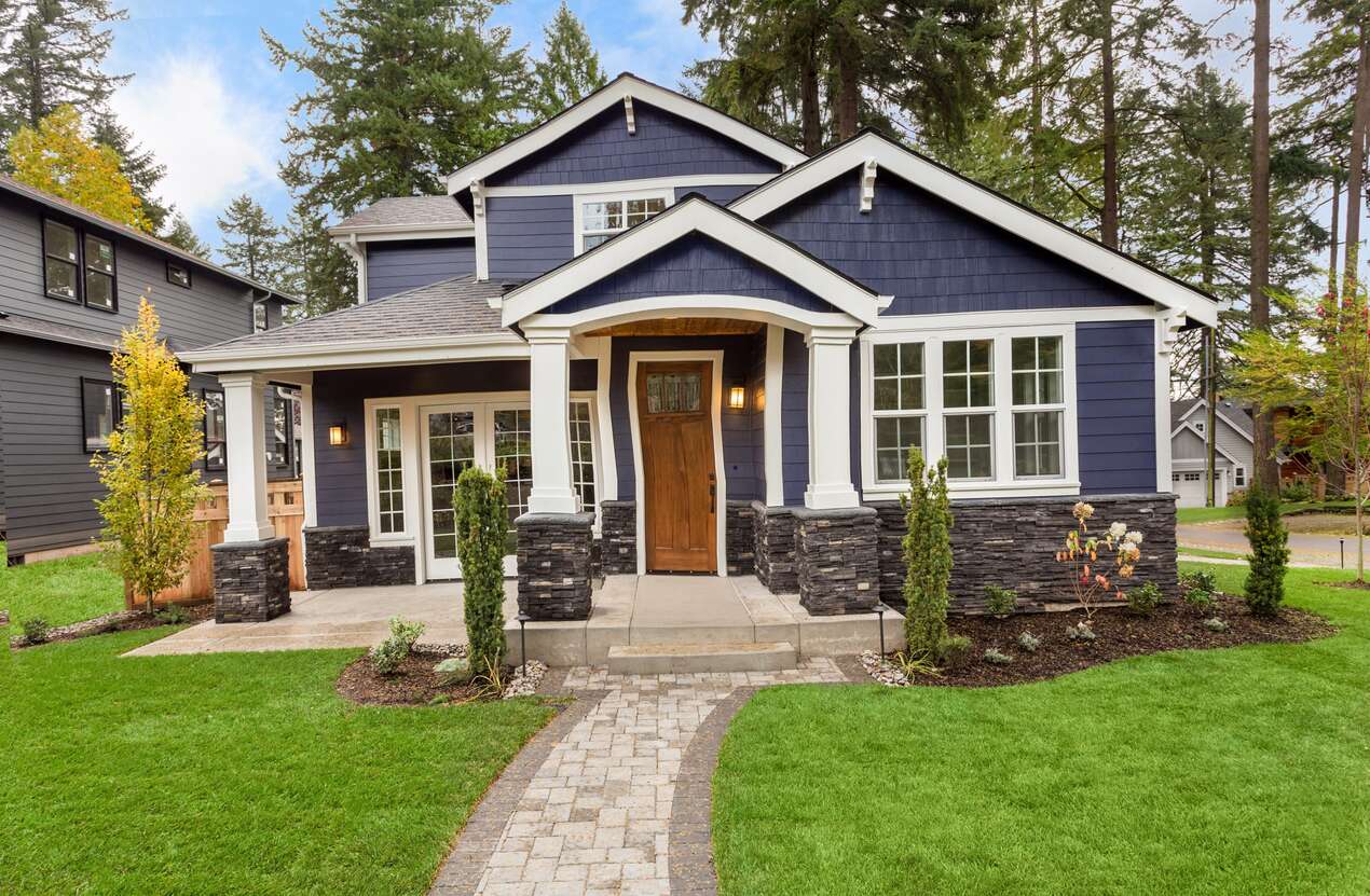 Front of a house in daylight from the perspective of someone with age-related macular degeneration. First of five stages.