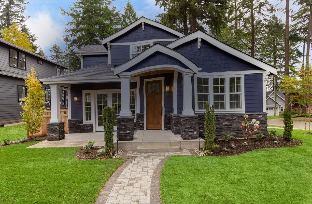 Front of a house in daylight from the perspective of someone with age-related macular degeneration. Second of five stages.