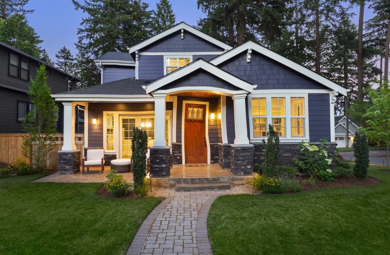 Front of a house at night from the perspective of someone with age-related macular degeneration. First of five stages.