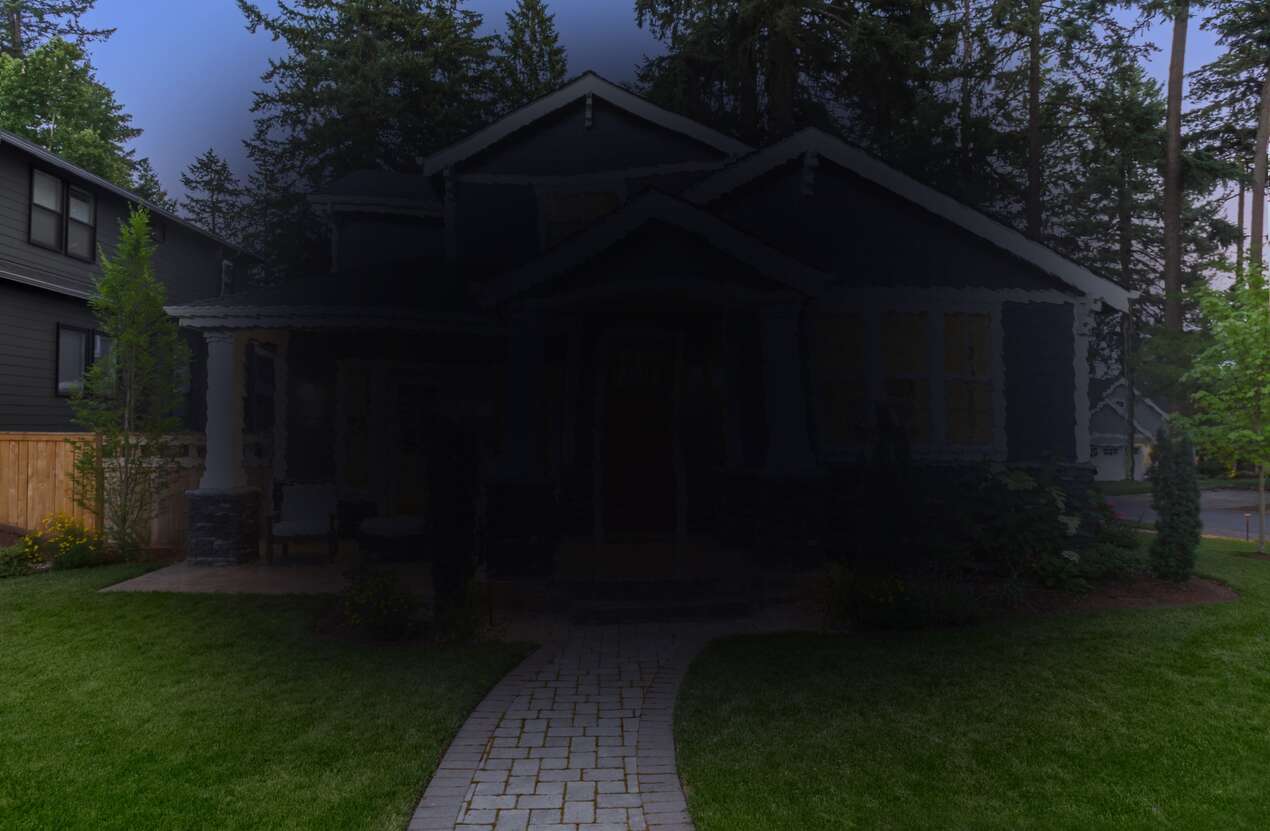 Front of a house at night from the perspective of someone with age-related macular degeneration. Fifth of five stages.