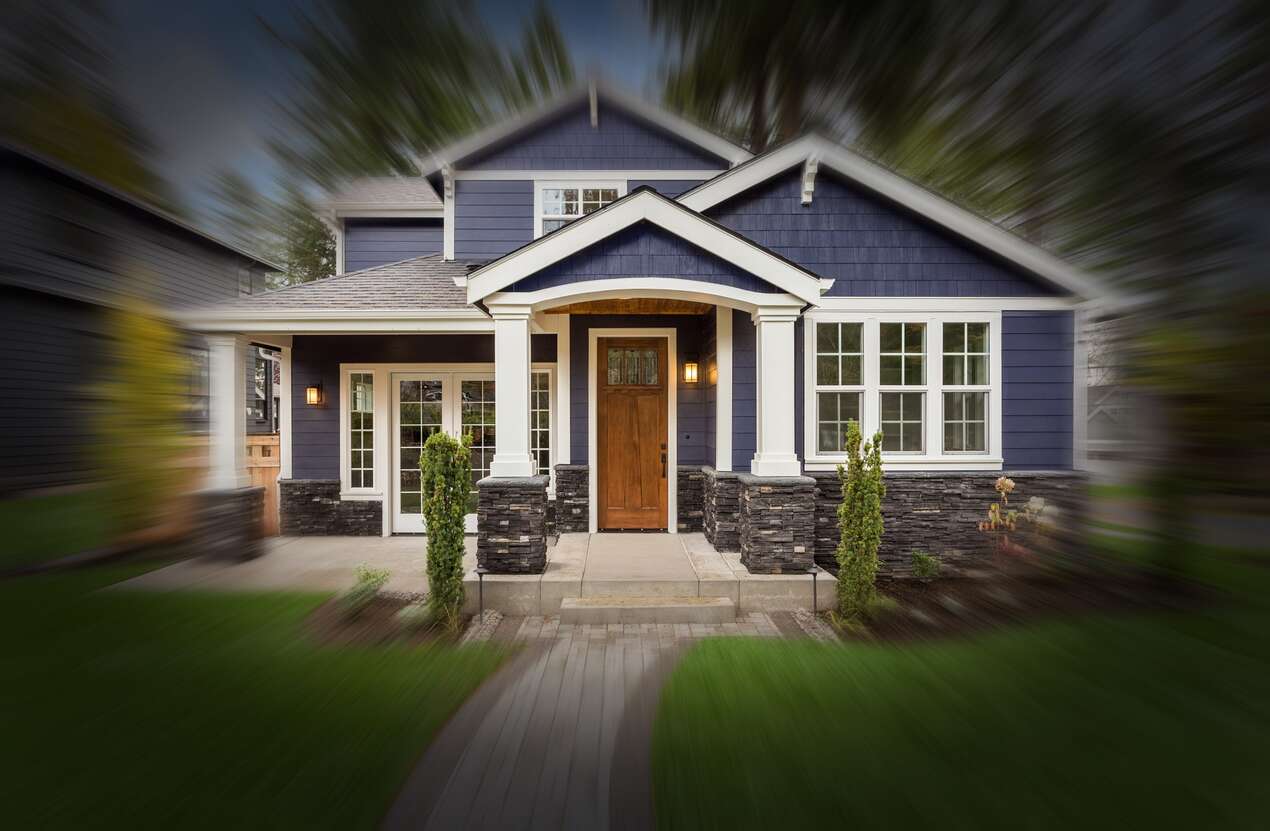 Front of a house in daylight from the perspective of someone with Bardet-Biedl syndrome. Third of five stages.