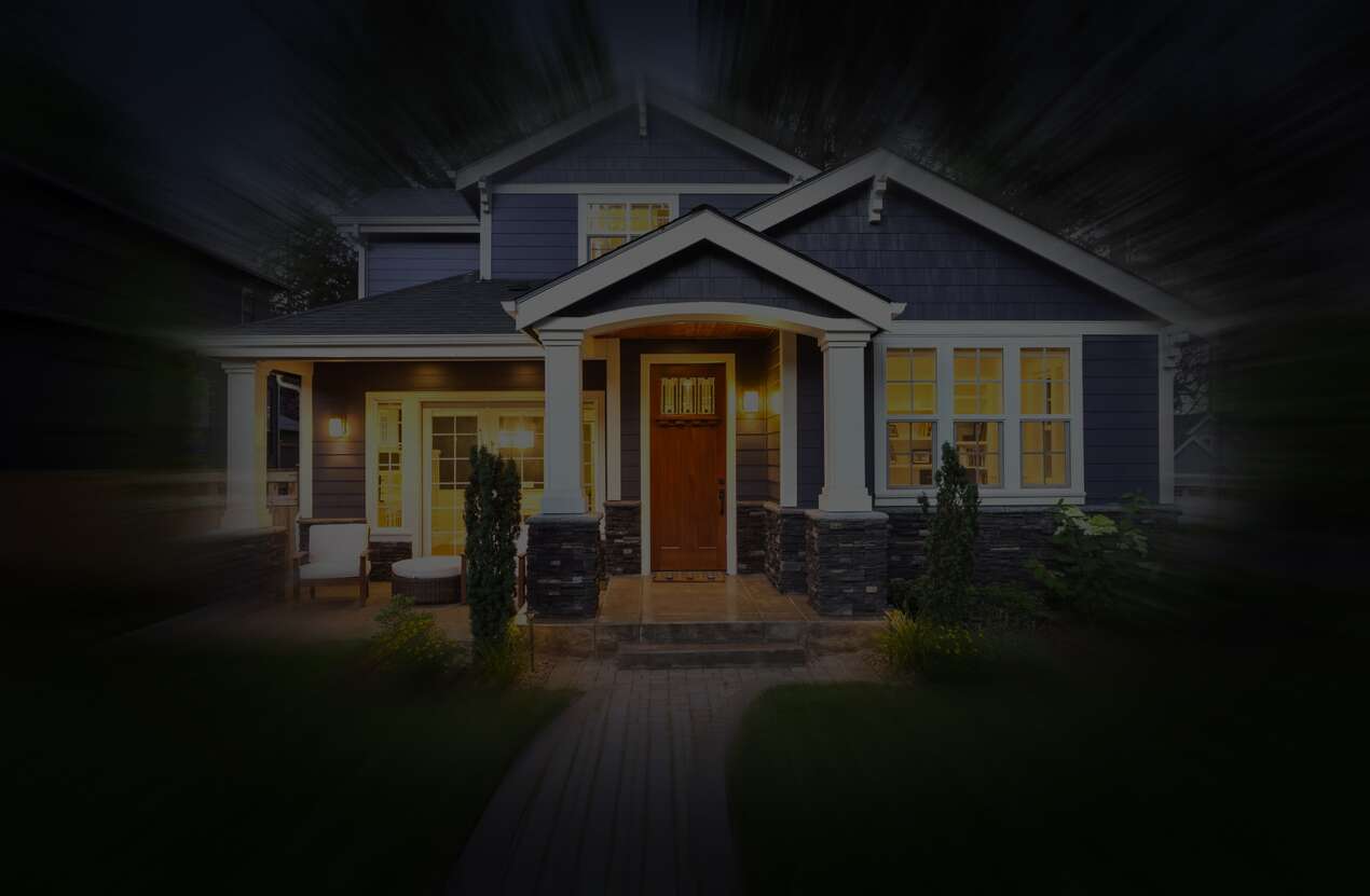 Front of a house at night from the perspective of someone with Bardet-Biedl syndrome. Third of five stages.