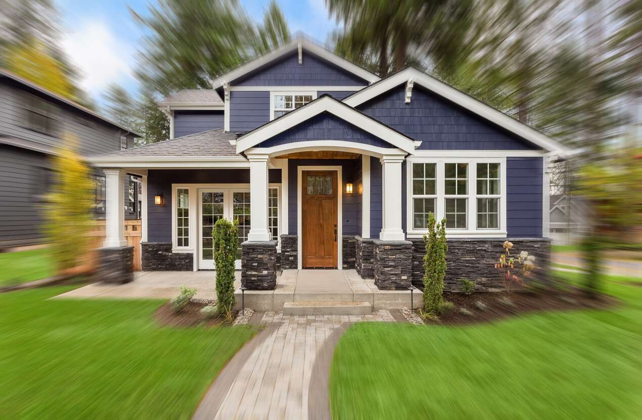 Front of a house in daylight from the perspective of someone with choroideremia. First of five stages.