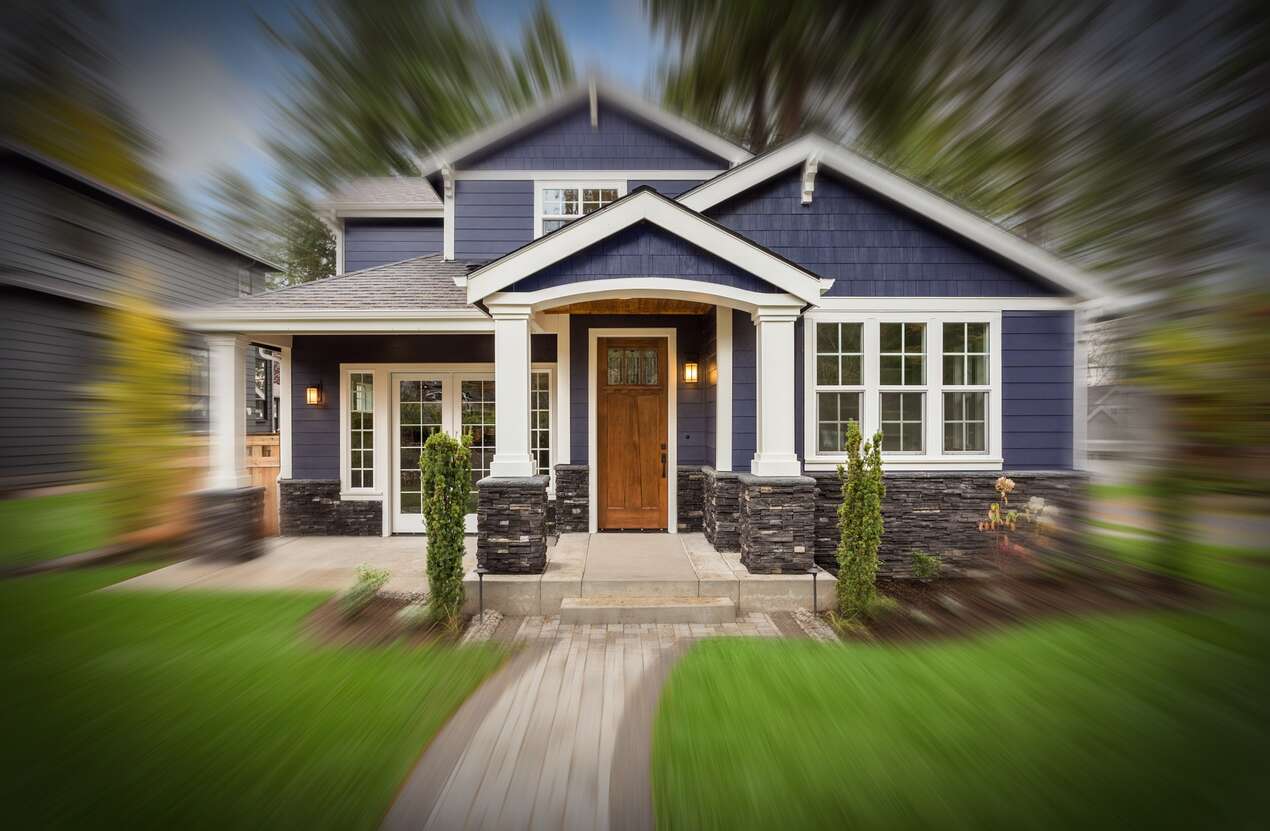 Front of a house in daylight from the perspective of someone with choroideremia. Second of five stages.