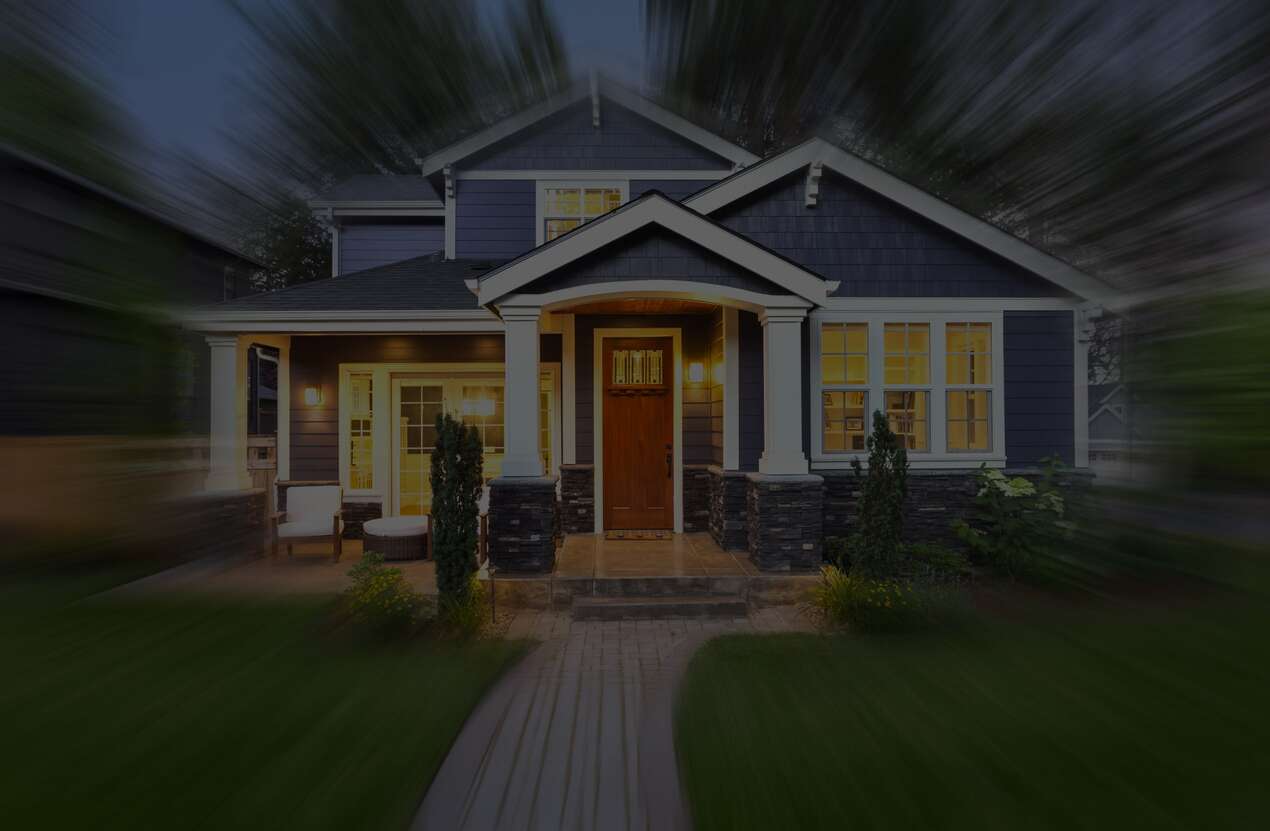 Front of a house at night from the perspective of someone with choroideremia. Second of five stages.