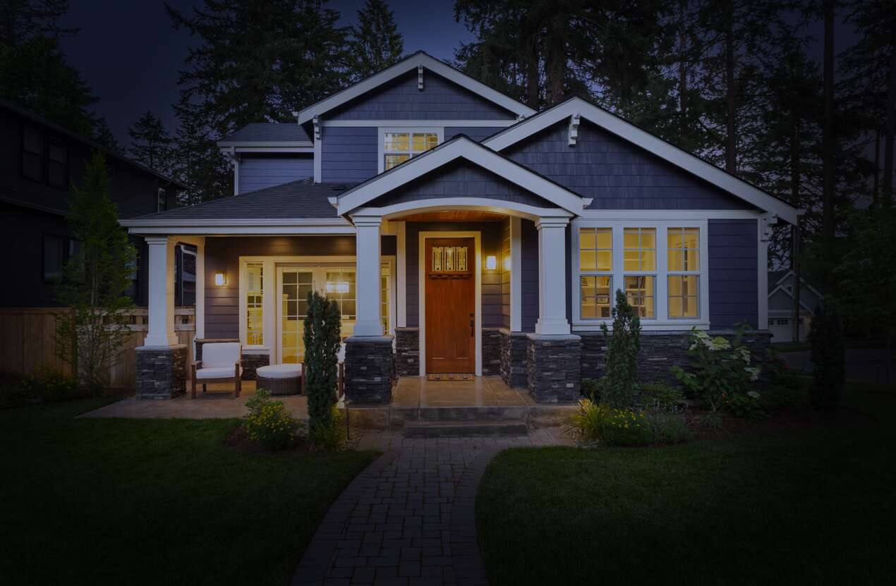 Front of a house at night from the perspective of someone with retinitis pigmentosa. First of five stages