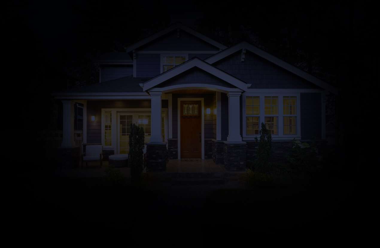 Front of a house at night from the perspective of someone with retinitis pigmentosa. Third of five stages