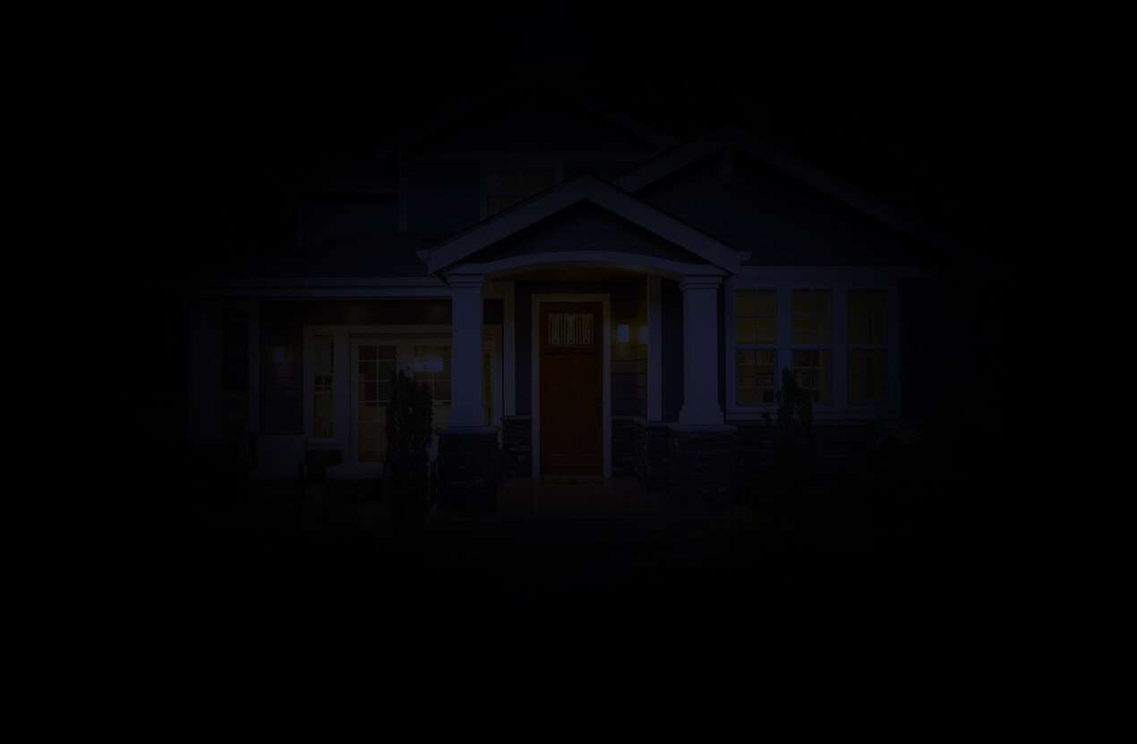 Front of a house at night from the perspective of someone with retinitis pigmentosa. Fourth of five stages