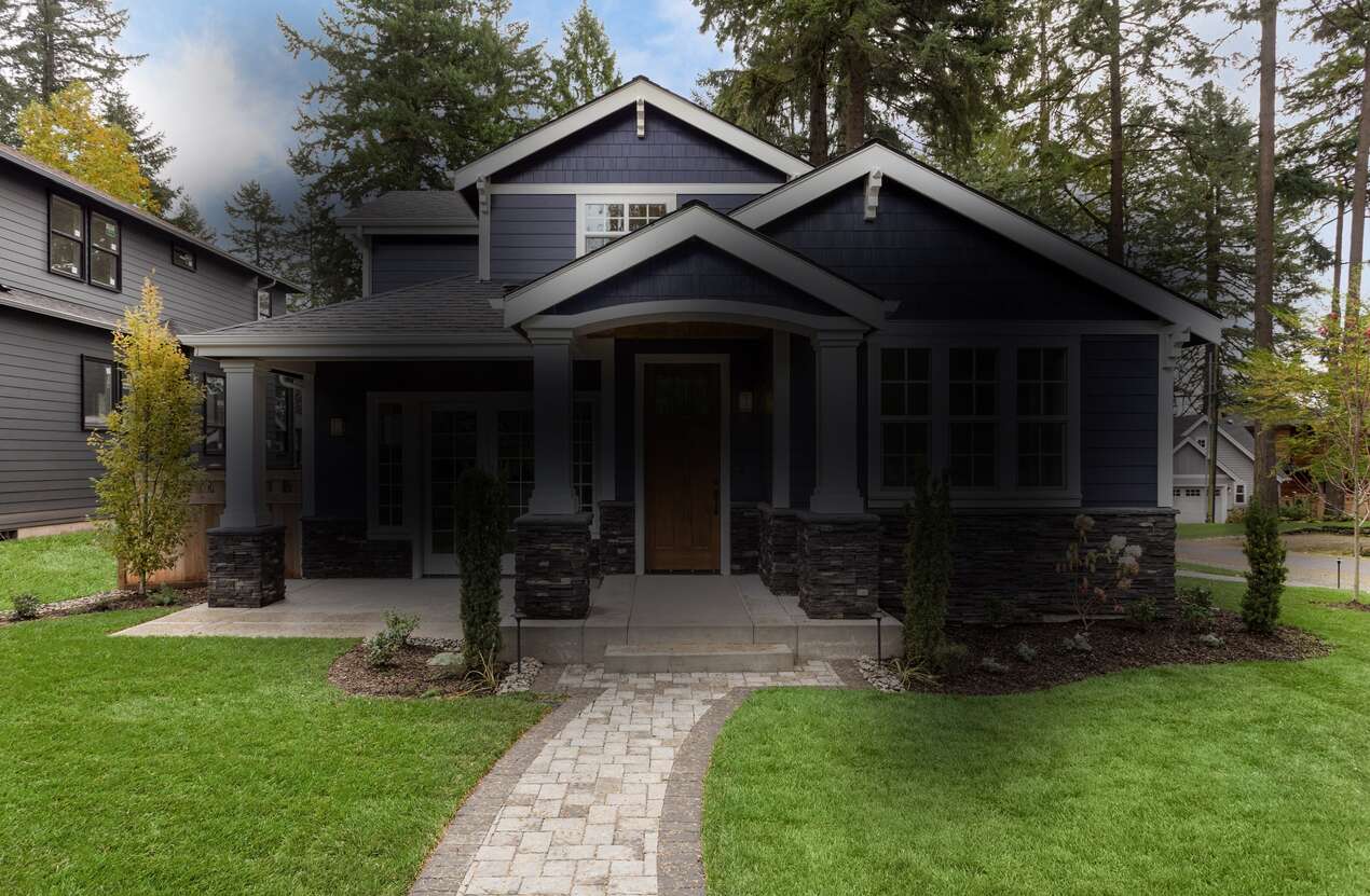 Front of a house in daylight from the perspective of someone with Stargardt disease. Third of five stages.