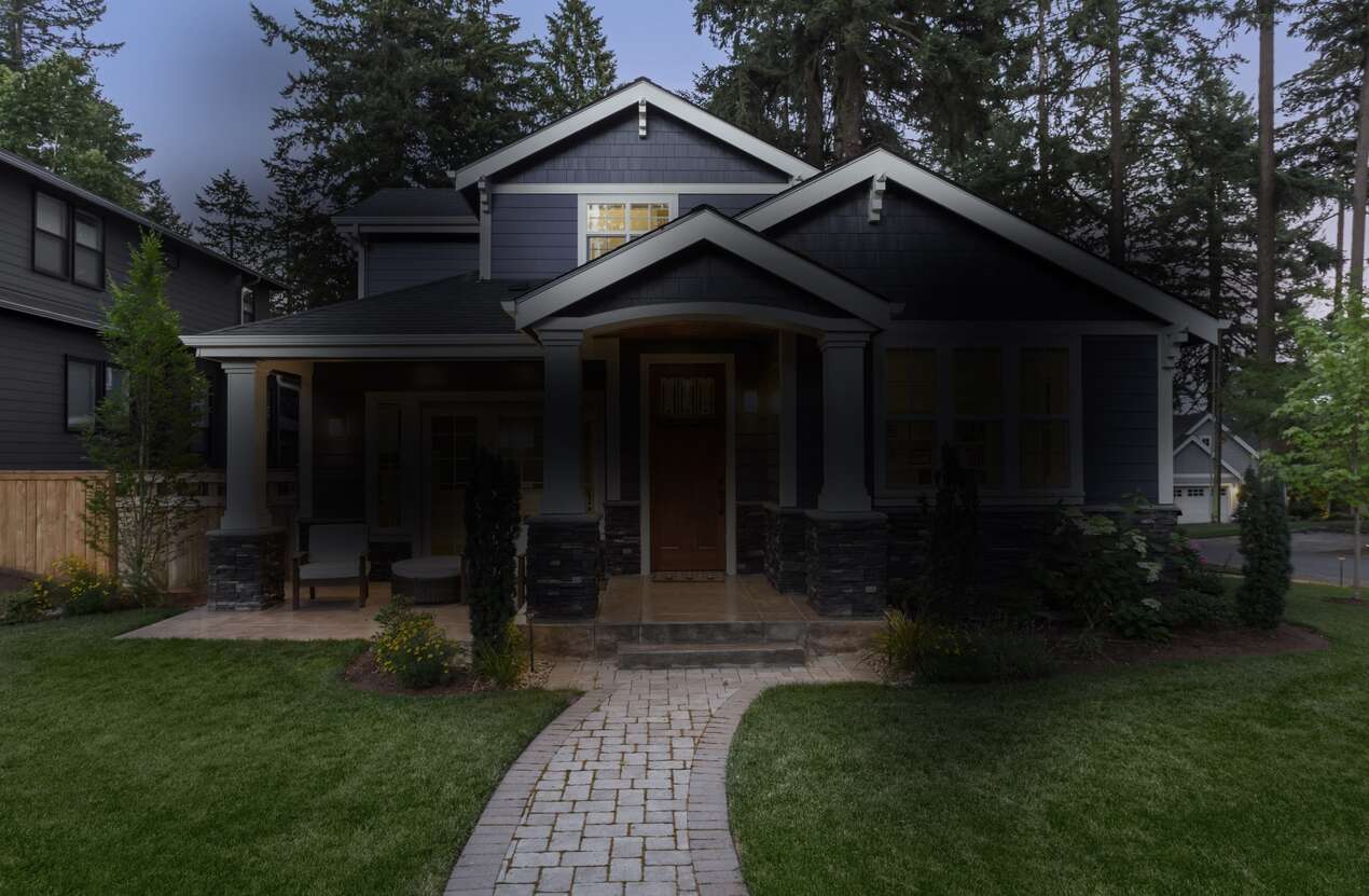 Front of a house at night from the perspective of someone with Stargardt disease. Third of five stages.