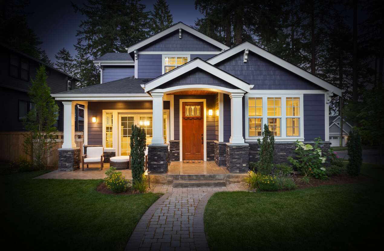 Front of a house at night from the perspective of someone with Usher syndrome. Second of five stages.