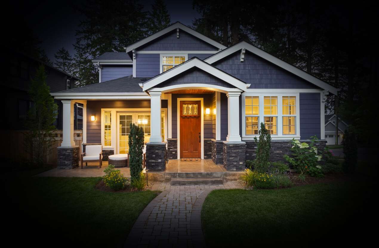 Front of a house at night from the perspective of someone with Usher syndrome. Third of five stages.