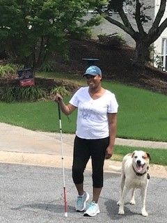 Manorthia outside walking with her dog