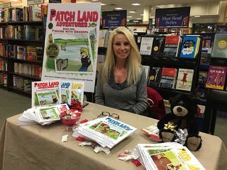 Carmen at a bookstore promoting her book series, Patch Land Adventures.