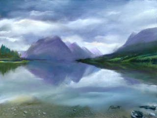 This pastel is an impressionist interpretation from a video by Ben Shaberman, Foundation Fighting Blindness vice president, science communications. Ben’s work for the Foundation often inspires us, but this image, borrowed with permission from his video, moved me to create this work. The painting is a view of the east end of Glacier National Park. Cloud cover is giving way to late day sunlight with slivers of brilliant green on the distant shore of a calm lake, with purple mountains reaching toward the sky and reflecting in the tranquil water.