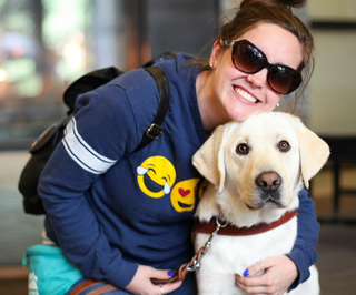 Shaela with her guide dog